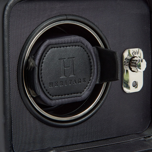 Luxury single watch winder from WOLF 1834 with chrome accents and a black exterior, designed to keep automatic timepieces wound, protected and ready to wear.