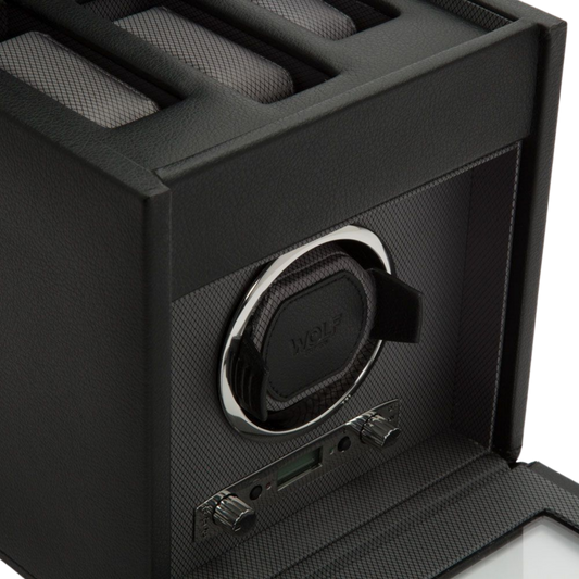 Luxury black watch winder from WOLF 1834 with integrated watch storage, designed to keep automatic watches wound, protected and ready to wear.