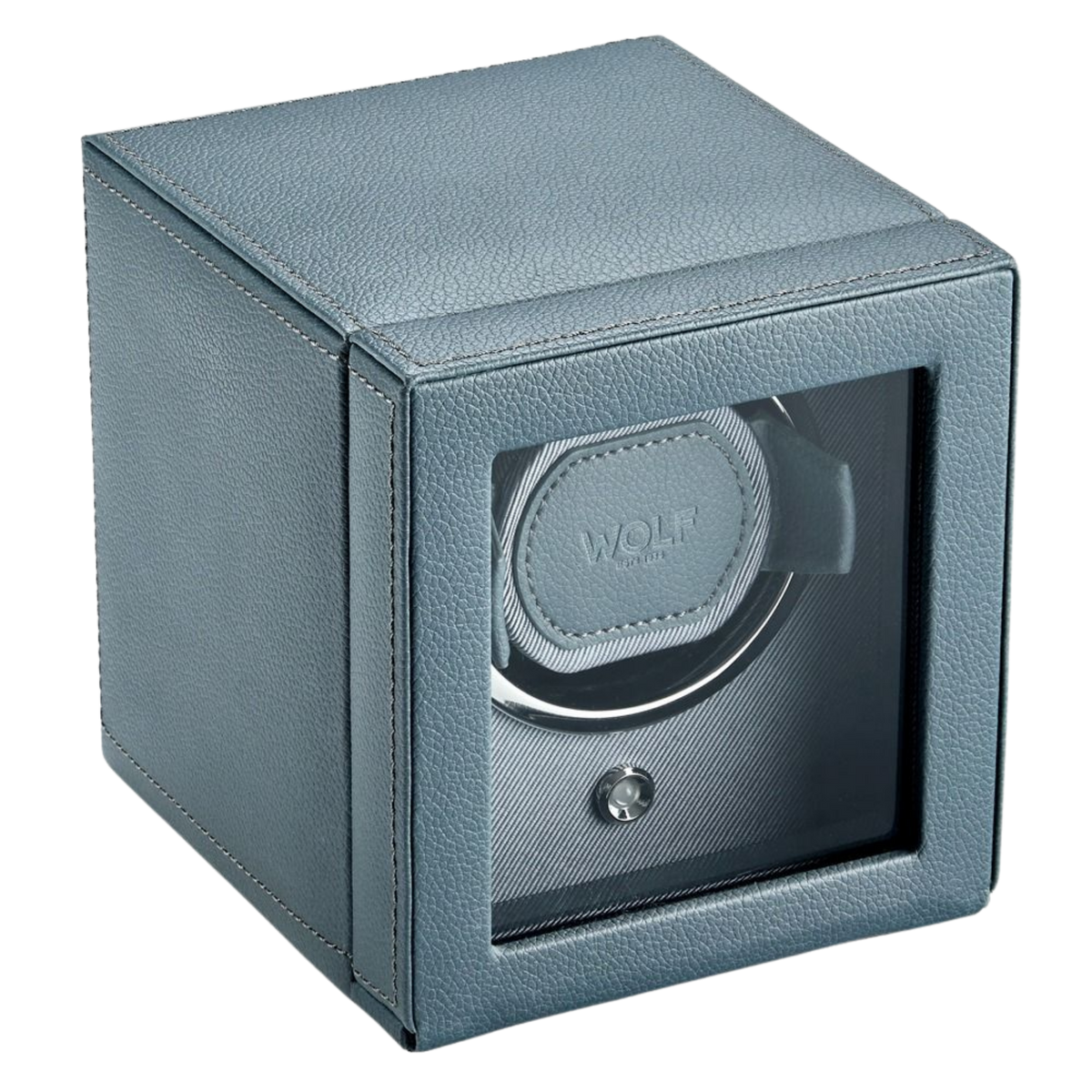 The WOLF Cub Watch Winder opened to reveal its precision-engineered interior, featuring a secure lock-in dynamic cuff designed to gently hold your timepiece in place. Finished in sophisticated Future Grey vegan leather, it blends contemporary design with Swiss-inspired functionality, making it a standout accessory for any watch enthusiast.