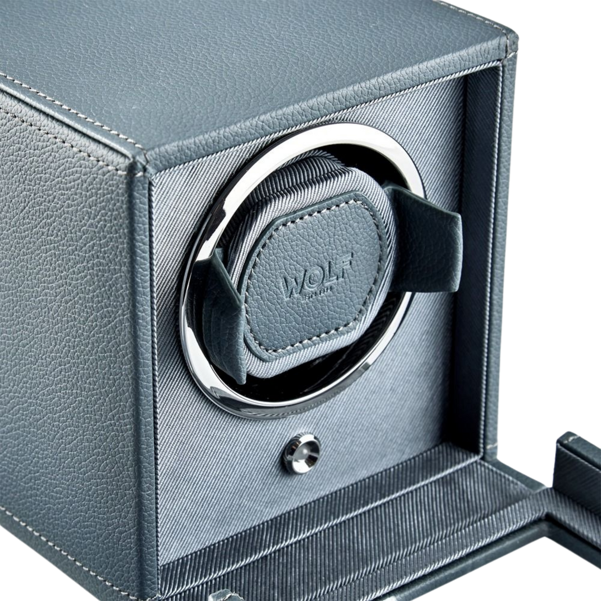 Close-up detailing highlights the premium craftsmanship of the WOLF 1834 Cub Winder, including its smooth vegan leather exterior and refined stitching. Every element is designed for durability and elegance, offering a luxury storage solution that protects automatic watches while enhancing any dresser or display space.