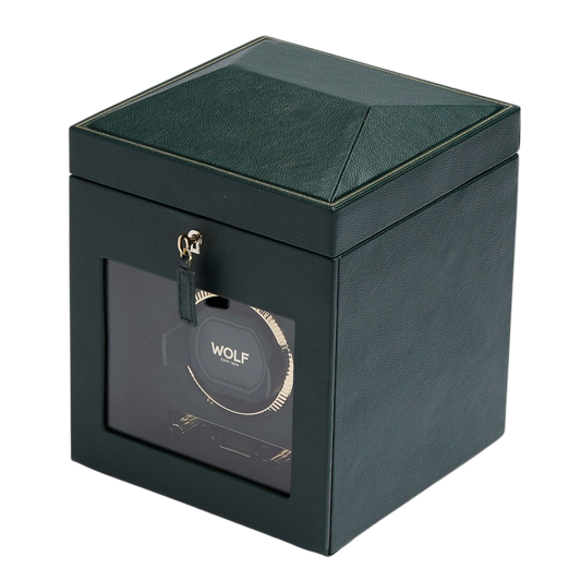 The WOLF 1834 British Racing Single Watch Winder in Green showcases a timeless, motorsport-inspired design finished in premium vegan leather with elegant gold hardware. Its structured silhouette and compact form combine classic British heritage styling with modern watch care functionality, making it a refined addition to any luxury watch collection.