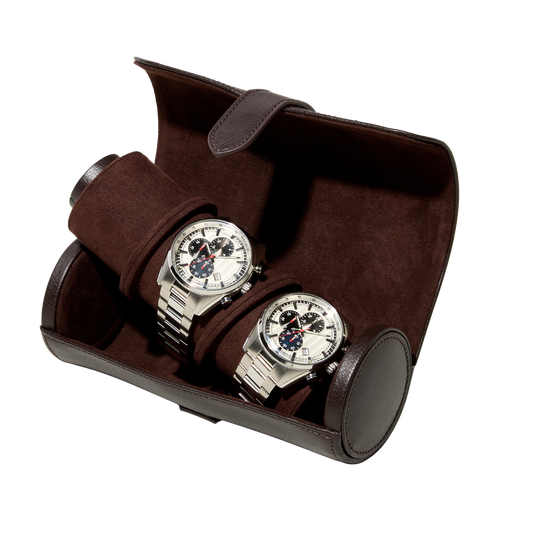 Designed for collectors on the move, the Wolf Blake Watch Roll features a classic cylindrical silhouette, secure snap closure in the a timeless chocolate brown colour.  