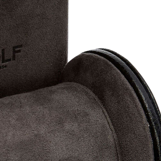 Opened to reveal its protective interior, the watch roll features a soft lining designed to cushion a single timepiece against scratches and movement. A secure internal watch guard holds the watch firmly in place, ensuring stability whether stored at home or carried during travel.
