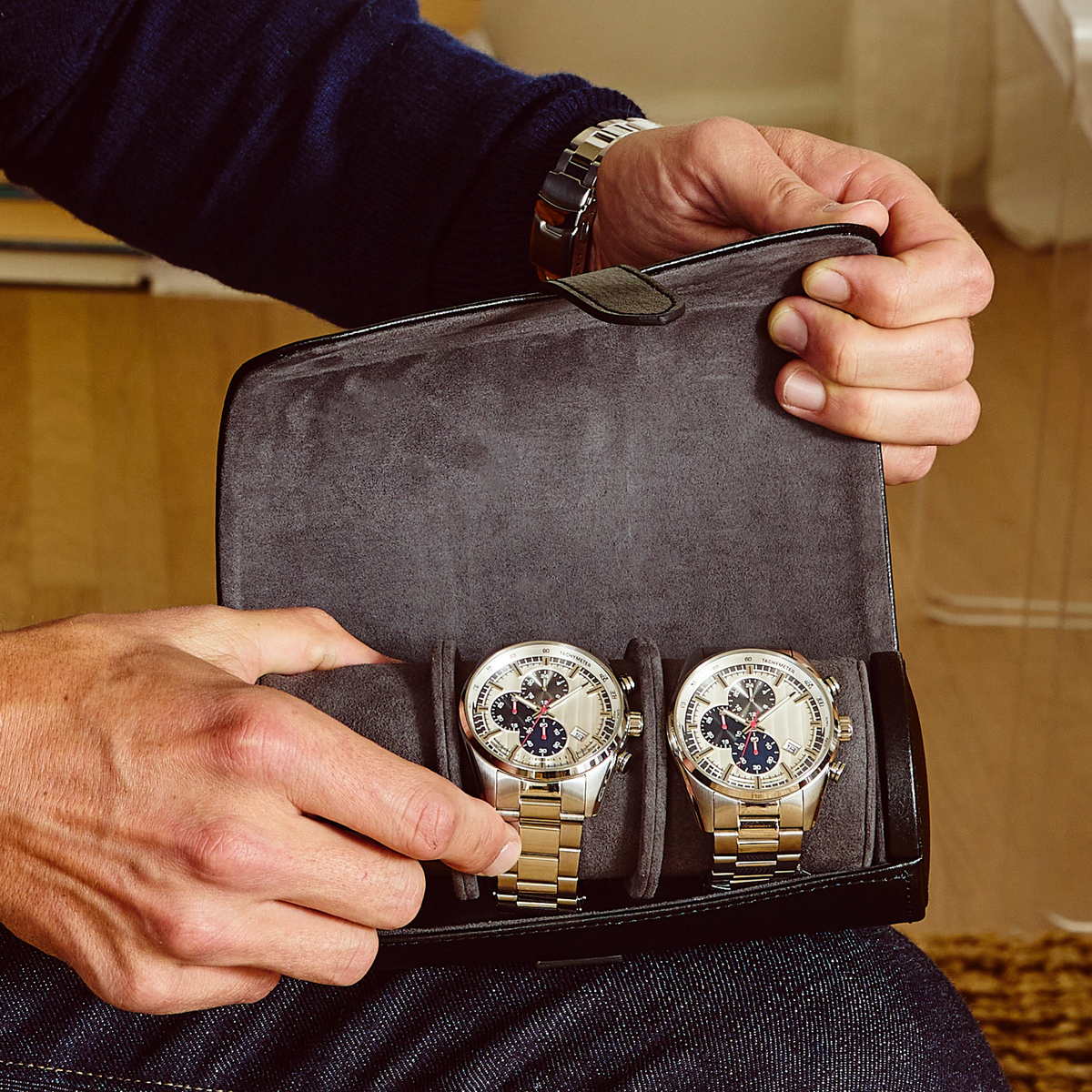 Blending luxury materials with practical functionality, the Wolf Blake Watch Roll in Black and Grey includes a hidden jewellery capsule for cufflinks, rings, and small valuables, making it an essential travel accessory for watch enthusiasts and collectors alike.