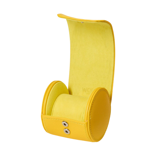 The Wolf Tutti Frutti Single Watch Roll in Yellow offers a bold yet refined way to store and transport a single timepiece.
Crafted in premium vegan leather, it combines vibrant colour with a compact, protective design.
Ideal for collectors who want secure storage with a modern, distinctive finish.