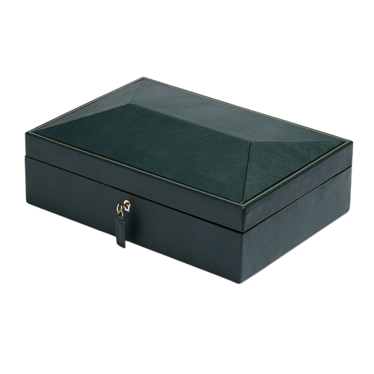 The Wolf British Racing 8 Piece Watch Box in Green is designed to showcase a collection with elegance and order.
Its rich green vegan leather exterior, gold-tone hardware, and distinctive panelled lid create a striking presentation piece for any watch enthusiast. Protecting and displaying up to eight watches, it blends luxury storage with timeless design.