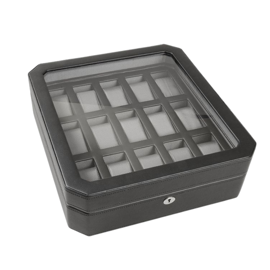 The Wolf Windsor 15 Piece Watch Box in Black is designed for collectors who enjoy seeing their collection displayed in one place.
A locking glass lid offers a clear view of up to fifteen watches, while the retro-inspired design adds a refined touch to any dresser, office, or watch room.