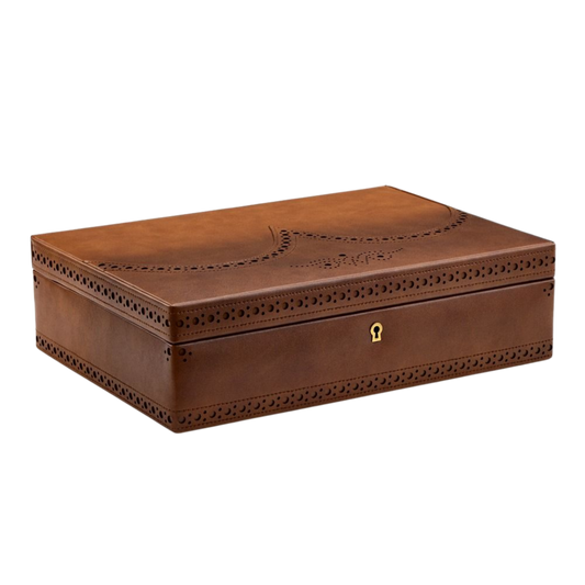 While rooted in heritage styling, the Brogue 10 Piece Watch Box includes thoughtful modern touches such as a secure lock-and-key closure and integrated USB charging port for a smartwatch.
It is designed to protect a growing collection while complementing contemporary lifestyles.