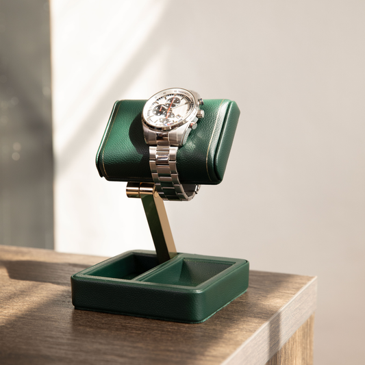 Thoughtfully designed with storage in the base for cufflinks, coins, or small accessories, the Wolf British Racing Single Travel Watch Stand in Green combines elegant presentation with everyday functionality for modern watch collectors.
