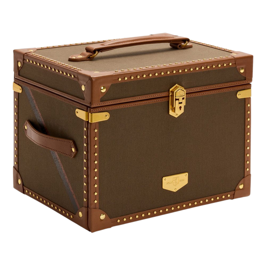 The Wolf Ida Trunk Jewellery Box in Khaki is a statement storage piece inspired by classic travel trunks.
Crafted from recycled canvas with top grain leather trim, it blends heritage design with modern luxury organisation.
A refined centrepiece designed to store and protect a complete jewellery collection.