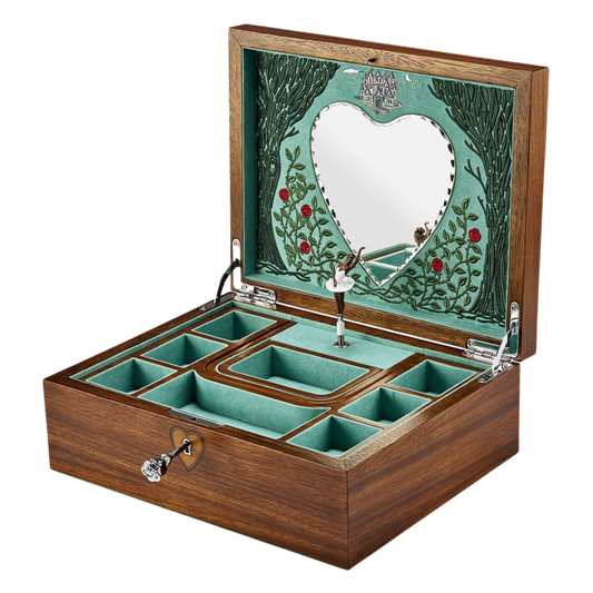 Open the lid to reveal a carefully designed interior inspired by the Sleeping Beauty story.
An embroidered backdrop frames the mirror and compartments, creating a theatrical setting for the rotating ballerina.
