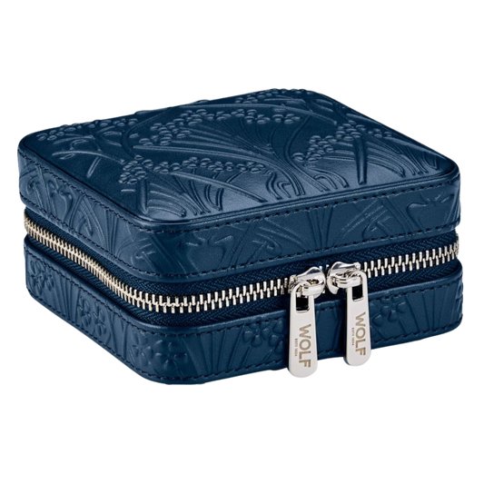 The Wolf x Liberty Small Travel Zip Case in navy showcases a compact, heritage-inspired design with Liberty’s iconic embossed pattern, blending timeless British style with modern jewellery organisation for travel and everyday use.