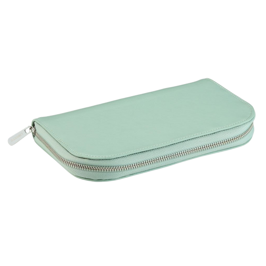The Wolf x Liberty Travel Portfolio in Sage Green combines elegant British design with practical jewellery organisation, featuring a sleek travel-friendly profile and a soft sage finish inspired by Liberty’s timeless aesthetic.