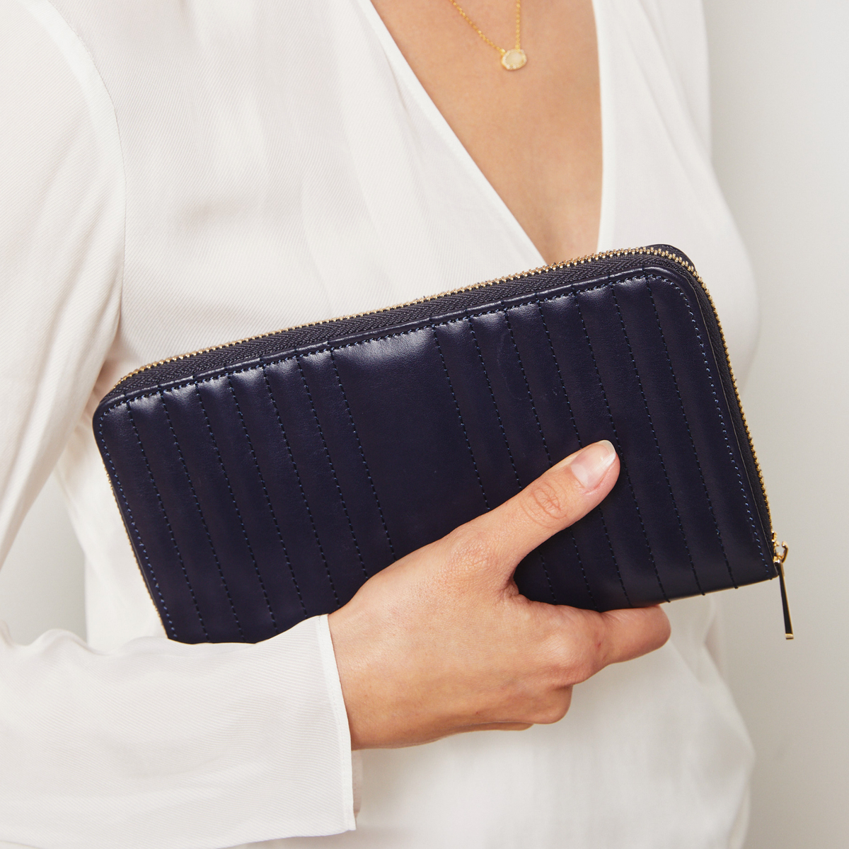 The Wolf Maria Jewellery Portfolio in Navy brings a sense of understated luxury, with its smooth leather finish, clean structured lines, and elegant gold-tone detailing. Designed with travel in mind, it feels refined, minimal, and effortlessly sophisticated from the outside in.