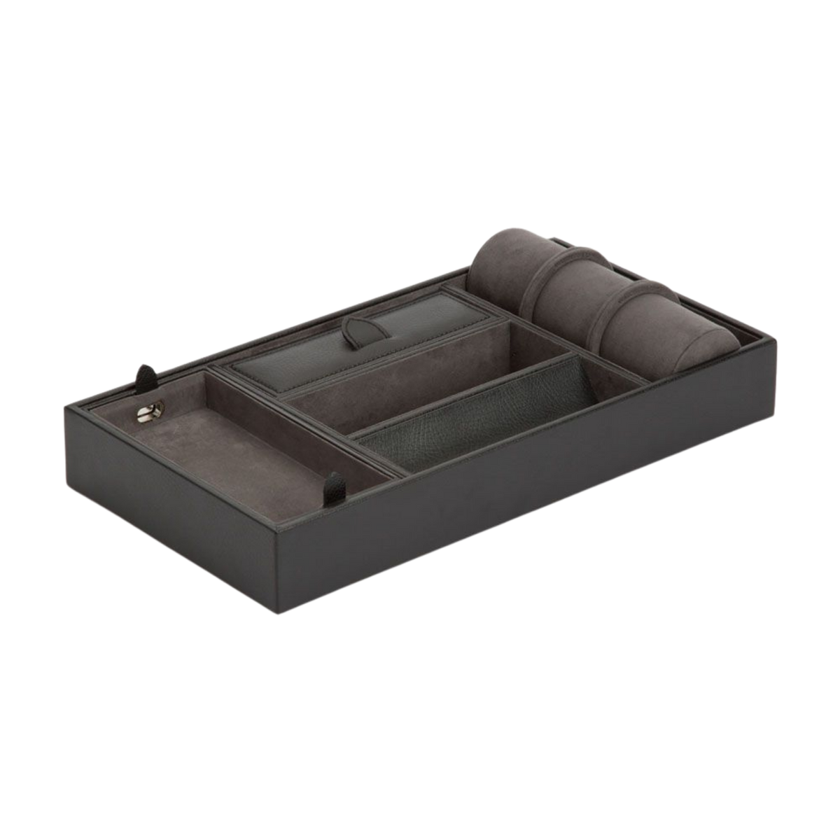 At the centre of the tray sits WOLF's interchangeable watch cuff, designed to securely hold and display your favourite timepieces.
Compatible with the Blake Watch Roll collection, the cuff can be removed and transferred with ease, making it a practical companion for travel and everyday watch rotation.