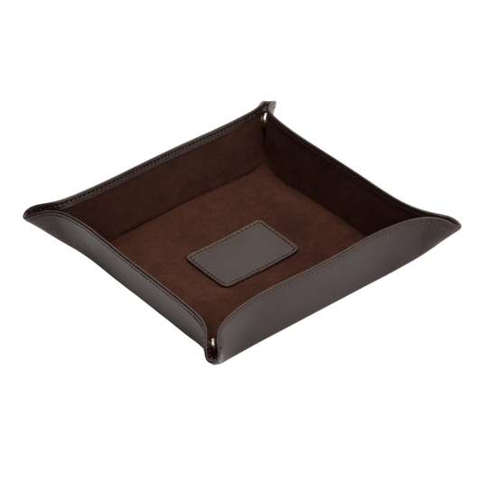 Finished in rich brown leather with chrome accents, the Blake Coin Tray combines timeless design with everyday practicality.
Its clean lines and structured shape create a refined look that complements both traditional and contemporary interiors.
Designed to look just as good empty as it does in use.