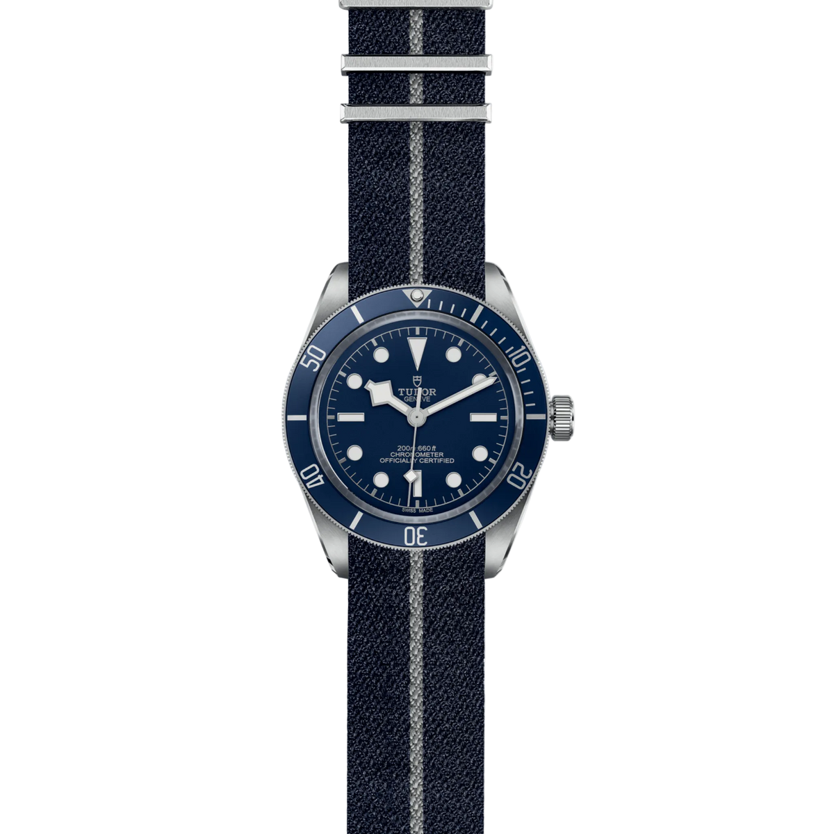 full view of Tudor watch showing the complete blue fabric strap and balanced case profile