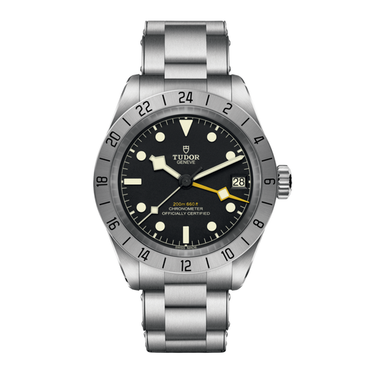 Tudor GMT watch with black dial, fixed 24-hour steel bezel, yellow GMT hand and stainless steel bracelet