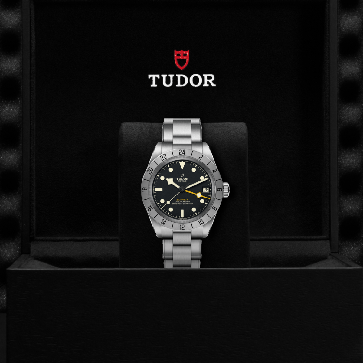 Tudor GMT watch displayed in its presentation box showcasing the premium packaging and interior finish