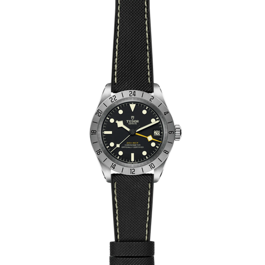 full view of Tudor GMT watch showing the full fabric strap and clean, versatile case profile