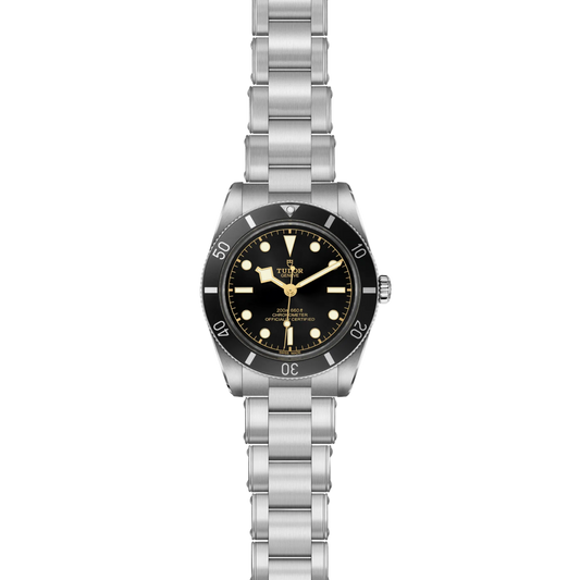 full view of Tudor watch showing the complete stainless steel bracelet and solid, balanced case profile