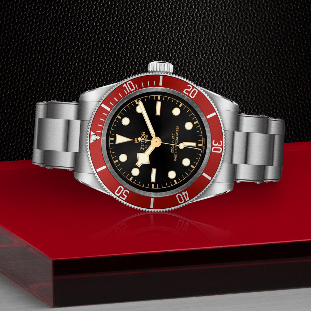 Tudor dive watch positioned on its side highlighting the case thickness, rotating bezel edge and screw-down crown