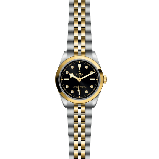 Tudor Black Bay One with black dial, diamond hour marker and yellow gold coloured stainless steel bezel.