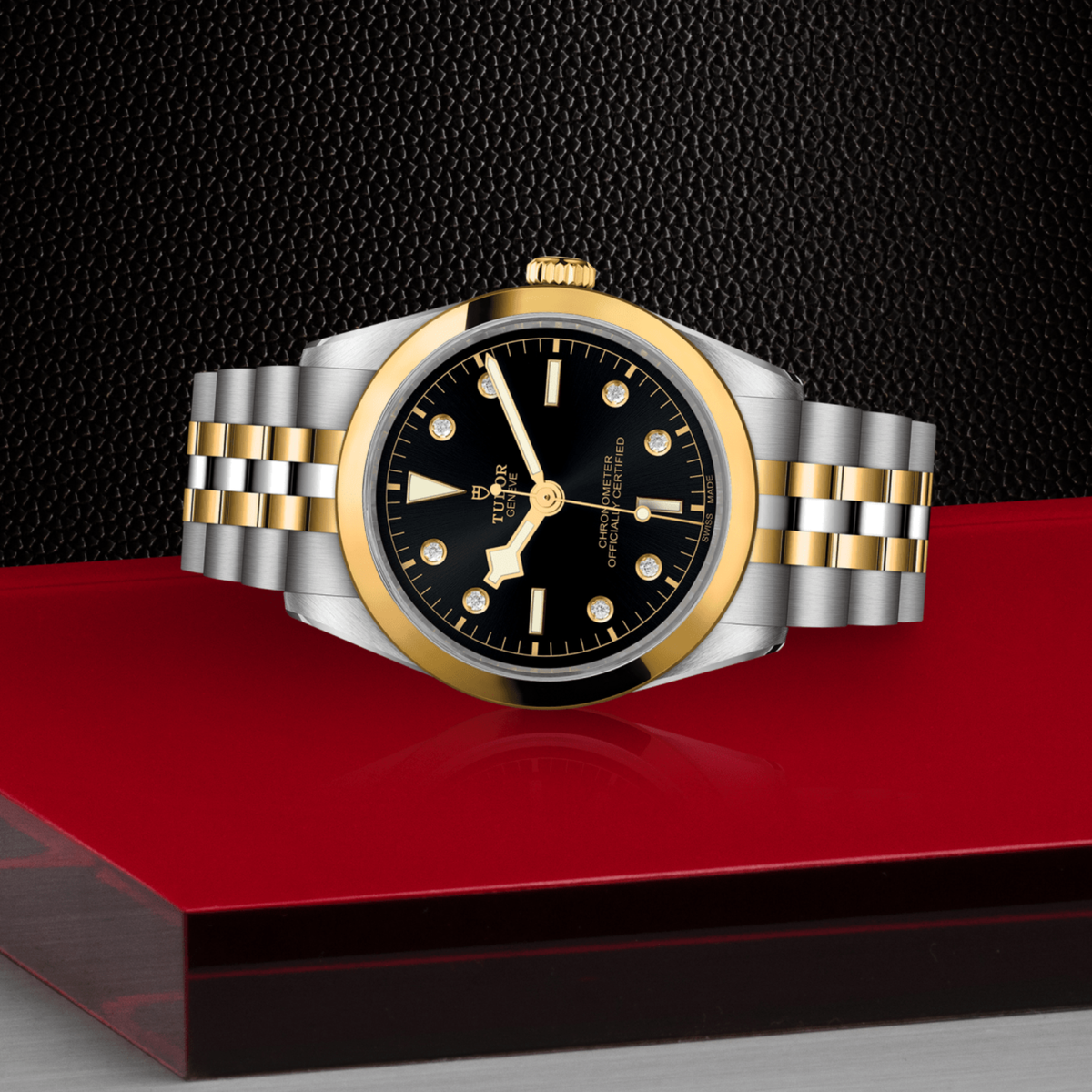 The black dial with diamond hour markers introduces a refined sparkle, balancing elegance with clear readability.
