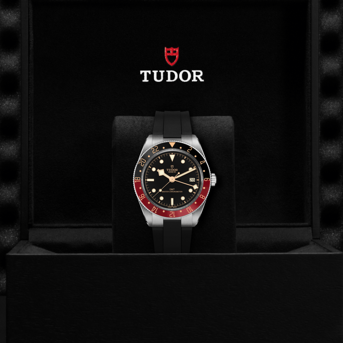 Tudor GMT watch displayed in its presentation box showcasing the premium packaging and interior finish