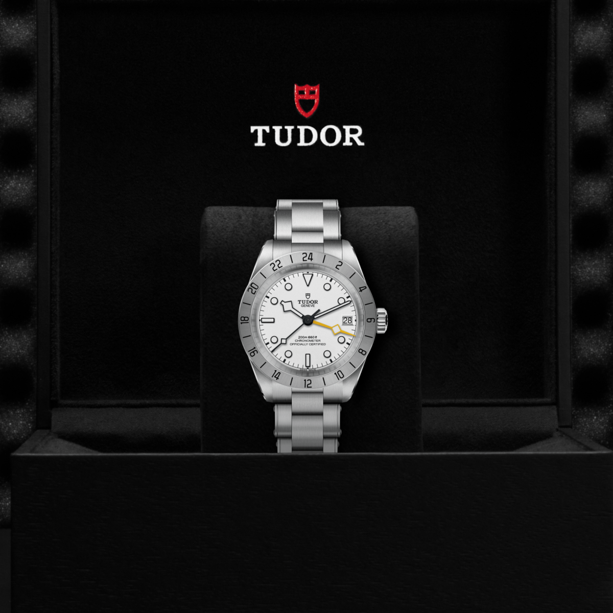 Tudor GMT watch displayed in its presentation box showcasing the premium packaging and interior finish