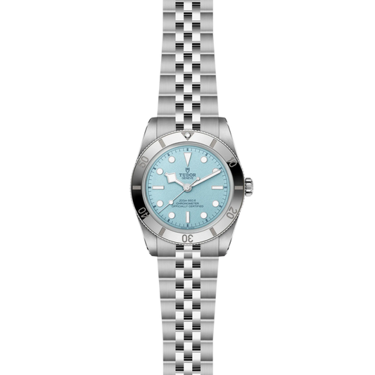 Silver watch with a light blue face on a white background