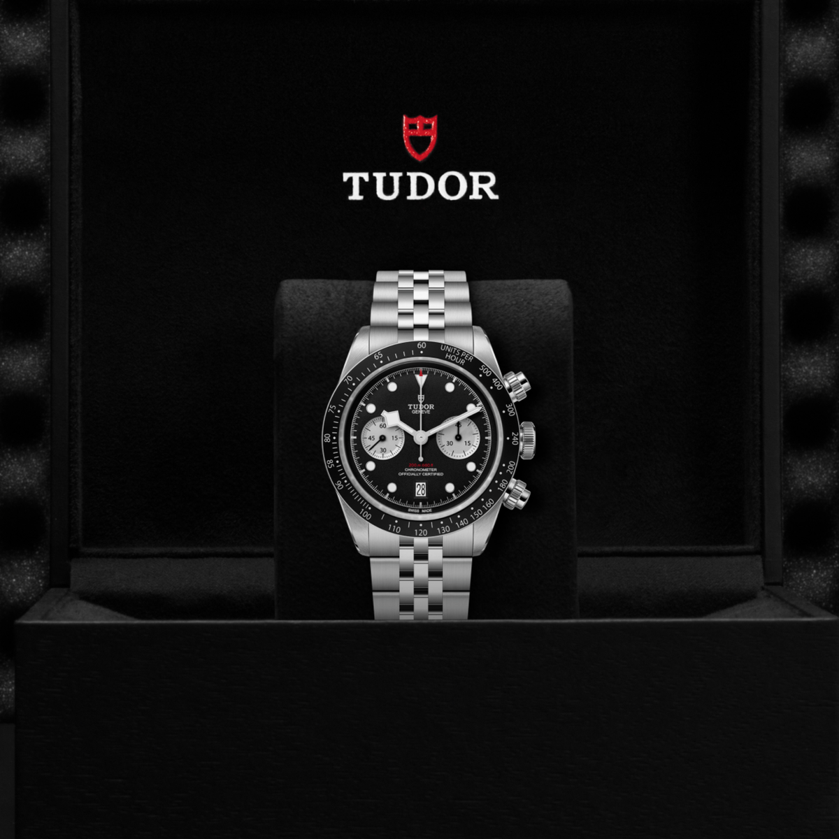 Tudor chronograph displayed in its presentation box showcasing the premium packaging and interior finish