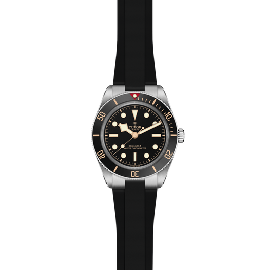 view of Tudor Black Bay watch case, crown and brushed stainless steel profile with unidirectional dive bezel detail
