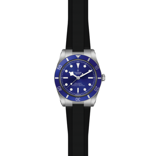 Image 1 front view of Tudor Black Bay blue dial dive watch with matching blue bezel and black rubber strap
