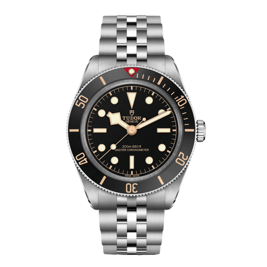 front view of Tudor Black Bay watch with black dial, black bezel, gilt-tone accents and stainless steel five-link bracelet