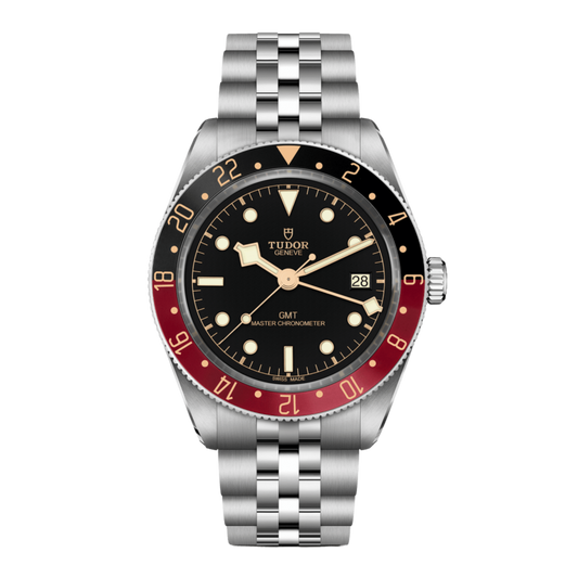 front view of Tudor Black Bay GMT watch with black dial, burgundy and black 24-hour bezel, GMT hand and stainless steel Jubilee-style bracelet
