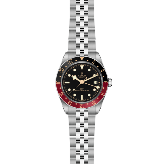 side view of Tudor GMT watch case, crown and brushed stainless steel profile with bidirectional 24-hour bezel detail
