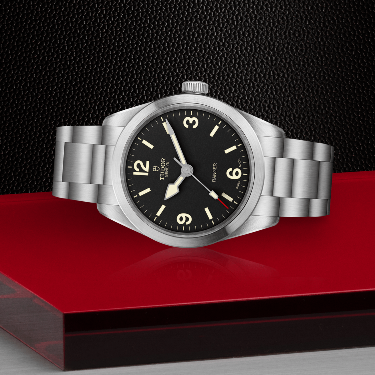 close-up of the black dial showing the Arabic numerals, luminous markers and signature Ranger layout