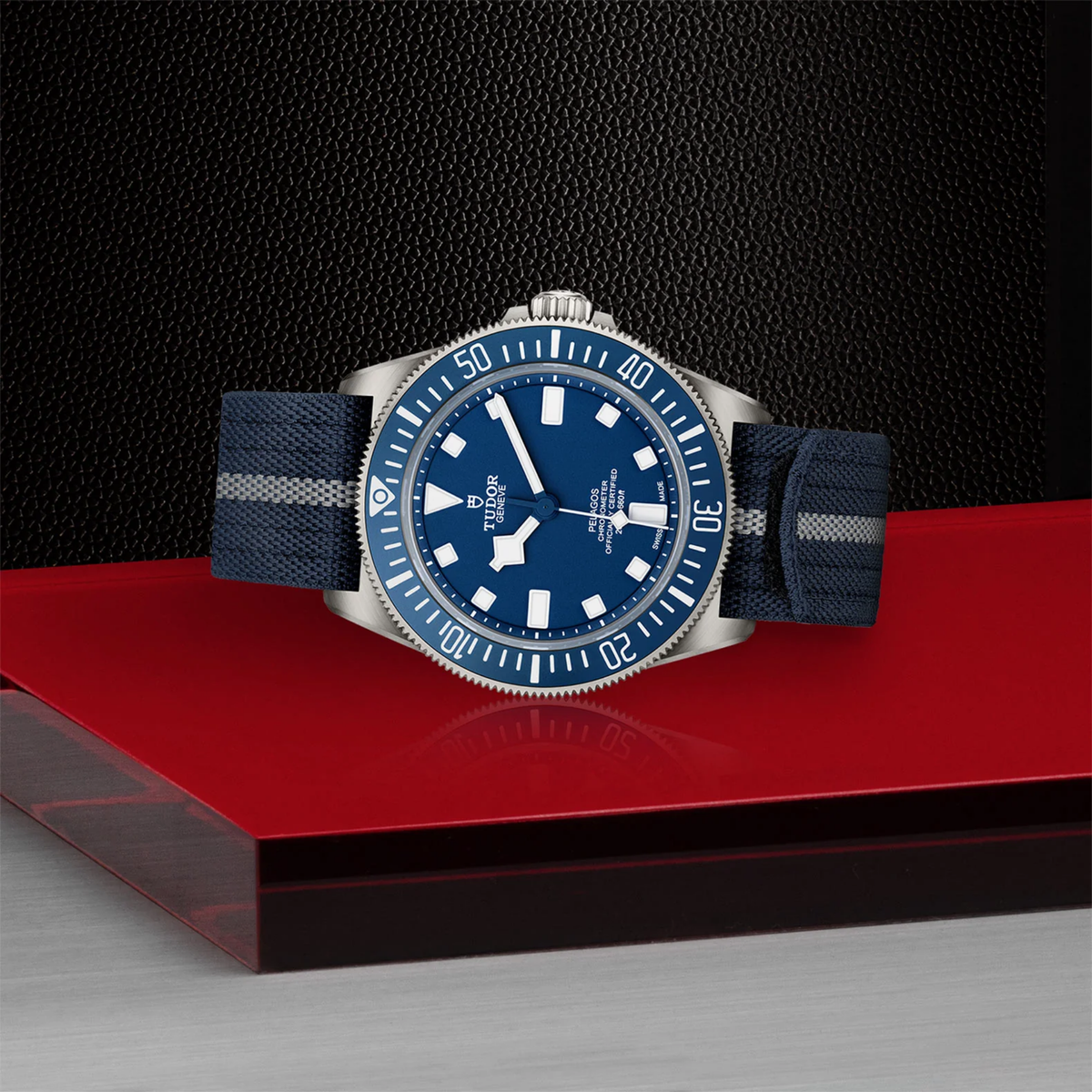 TUDOR Pelagos FXD automatic watch with blue dial, titanium case and navy blue fabric strap