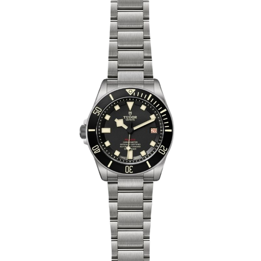 Front view of a Tudor Pelagos dive watch with a black dial, unidirectional black bezel, titanium case, date display, and matching titanium bracelet on a transparent background.