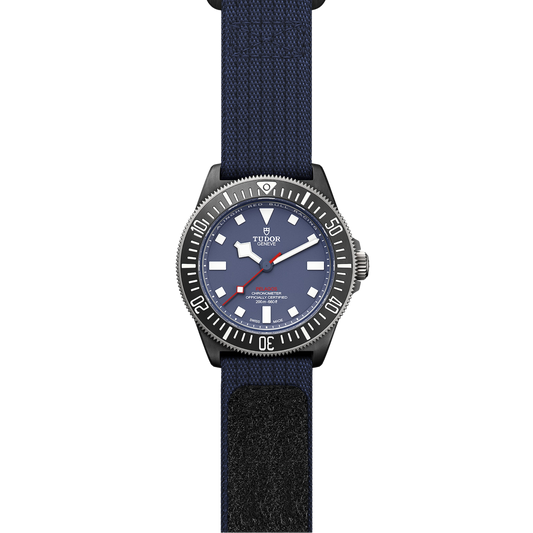 TUDOR Pelagos FXD 42mm automatic watch featuring a matte blue dial, black carbon composite case and titanium bezel