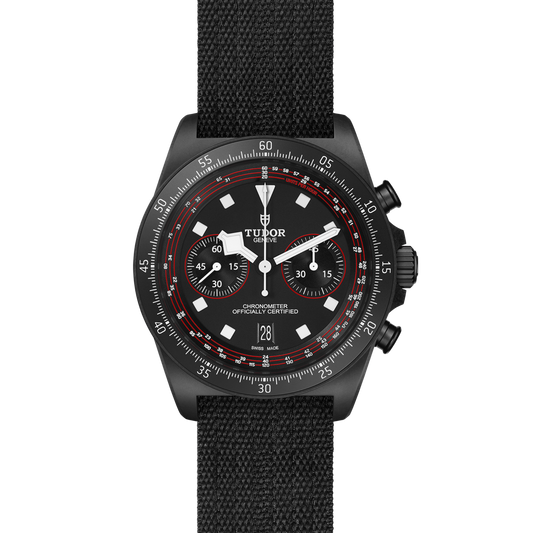 full view of Tudor Black Bay Chrono showcasing the matte black case and sporty fabric strap