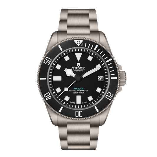 Tudor watch with black dial and silver bracelet on a transparent background.