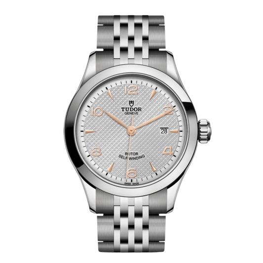 Tudor 1926 watch with silver textured dial, rose gold-tone numerals and stainless steel bracelet.