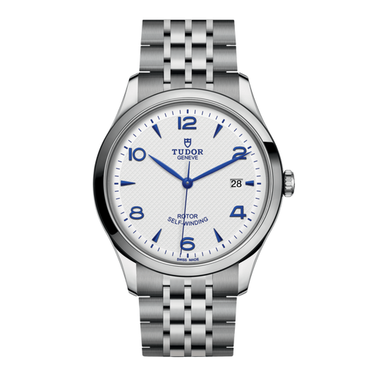 Tudor 1926 watch with white textured dial, blue numerals and stainless steel bracelet