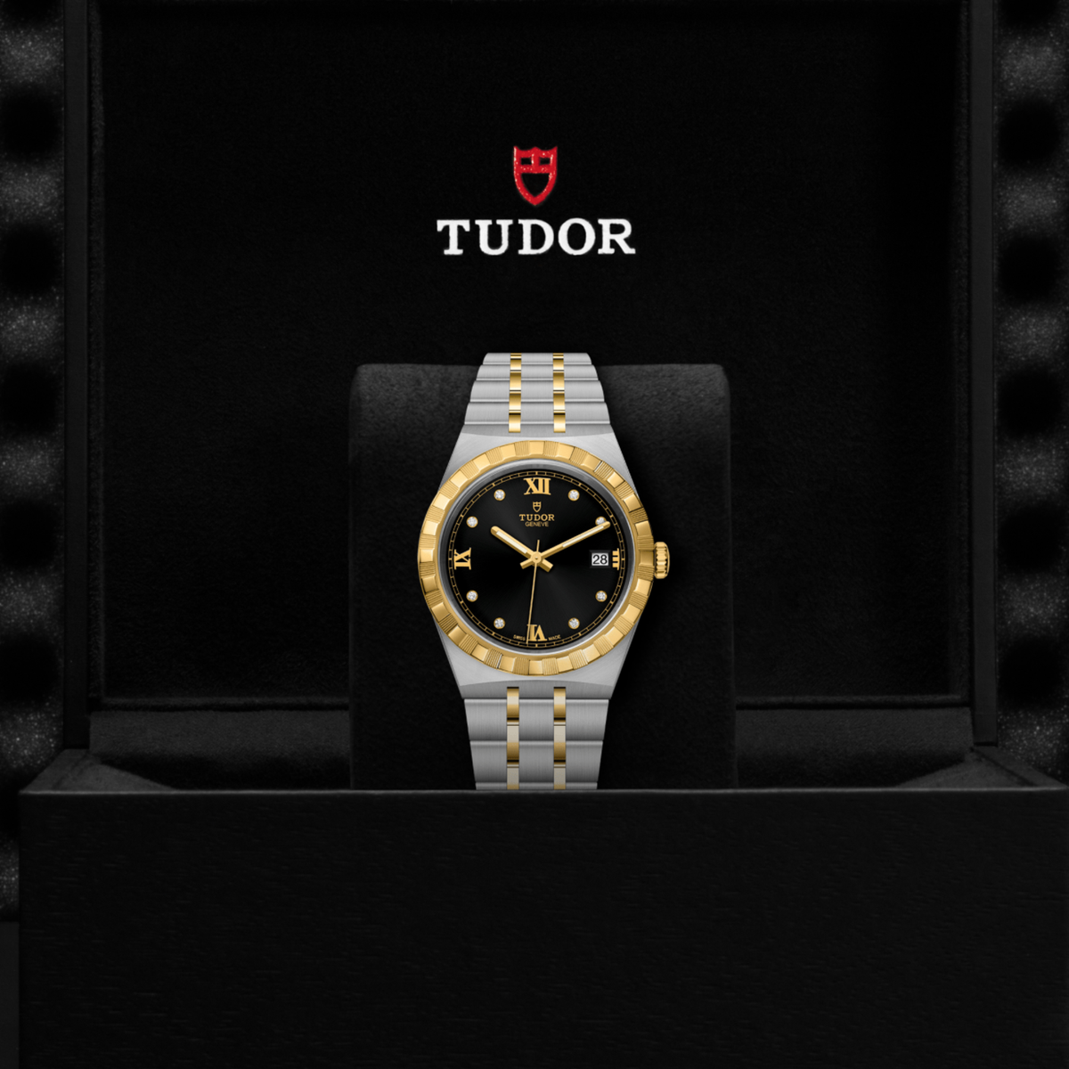 The automatic two-tone stainless steel Tudor Royal featuring a black dial and yellow gold coloured stainless steel bezel. 