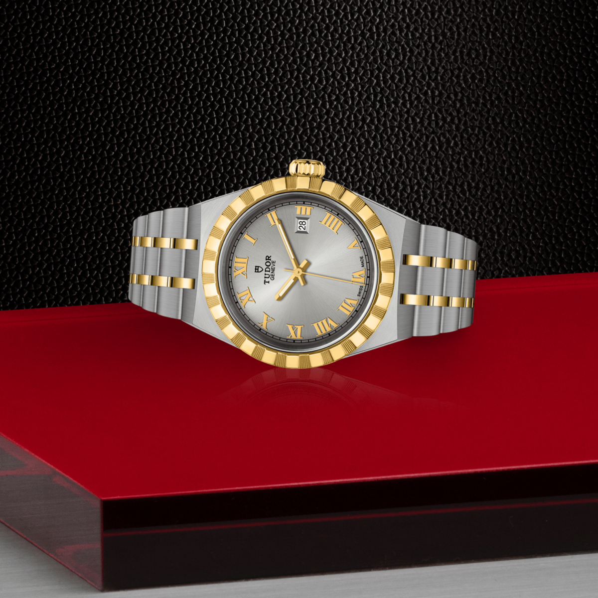 Tudor two-tone watch displayed in its presentation box showcasing the premium packaging and interior finish