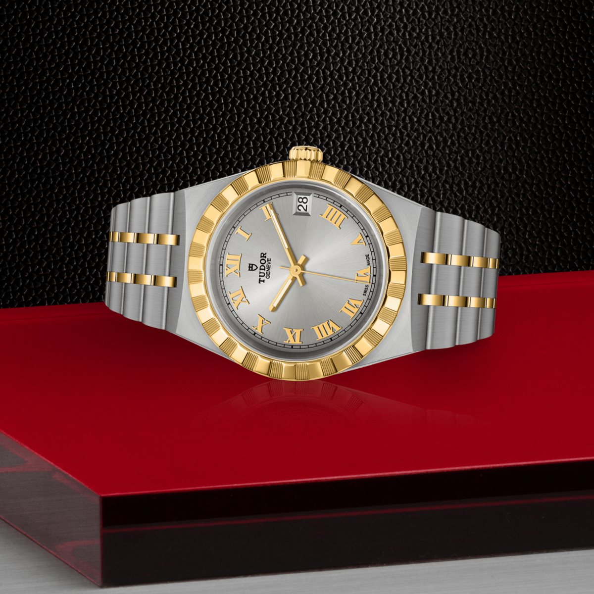 Tudor two-tone watch displayed in its presentation box showcasing the premium packaging and interior finish