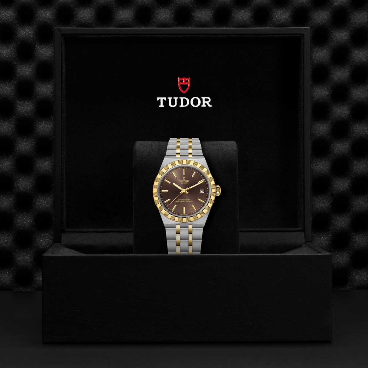 Blending classic styling with modern performance, the TUDOR Royal 36mm showcases a polished yellow gold bezel, brown dial and Swiss automatic movement for effortless sophistication.