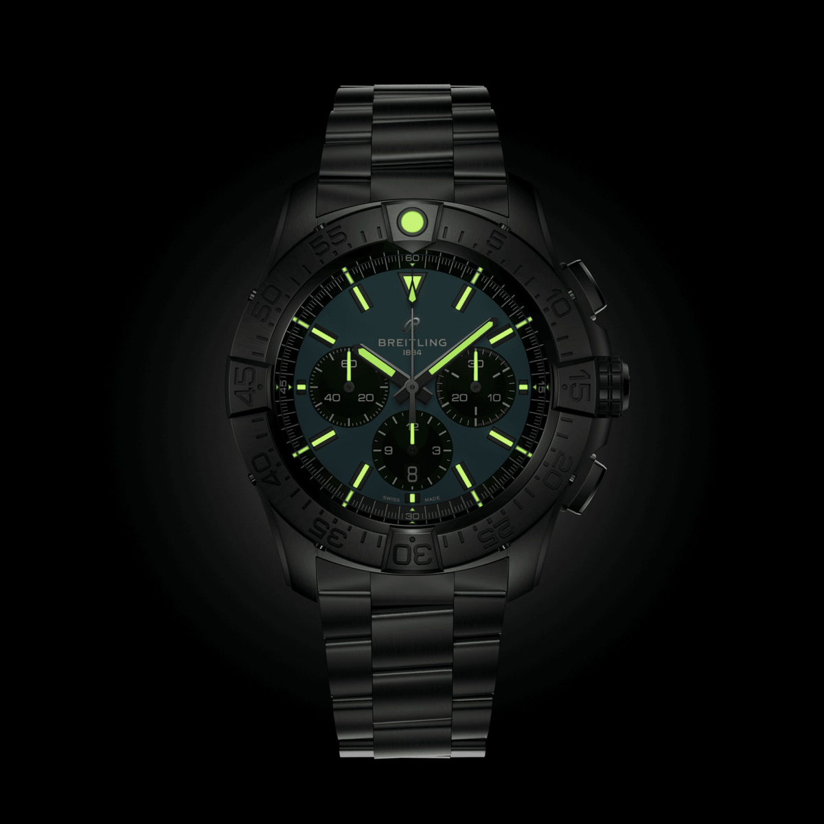 Luxury black chronograph watch with glowing green markers and dark dial